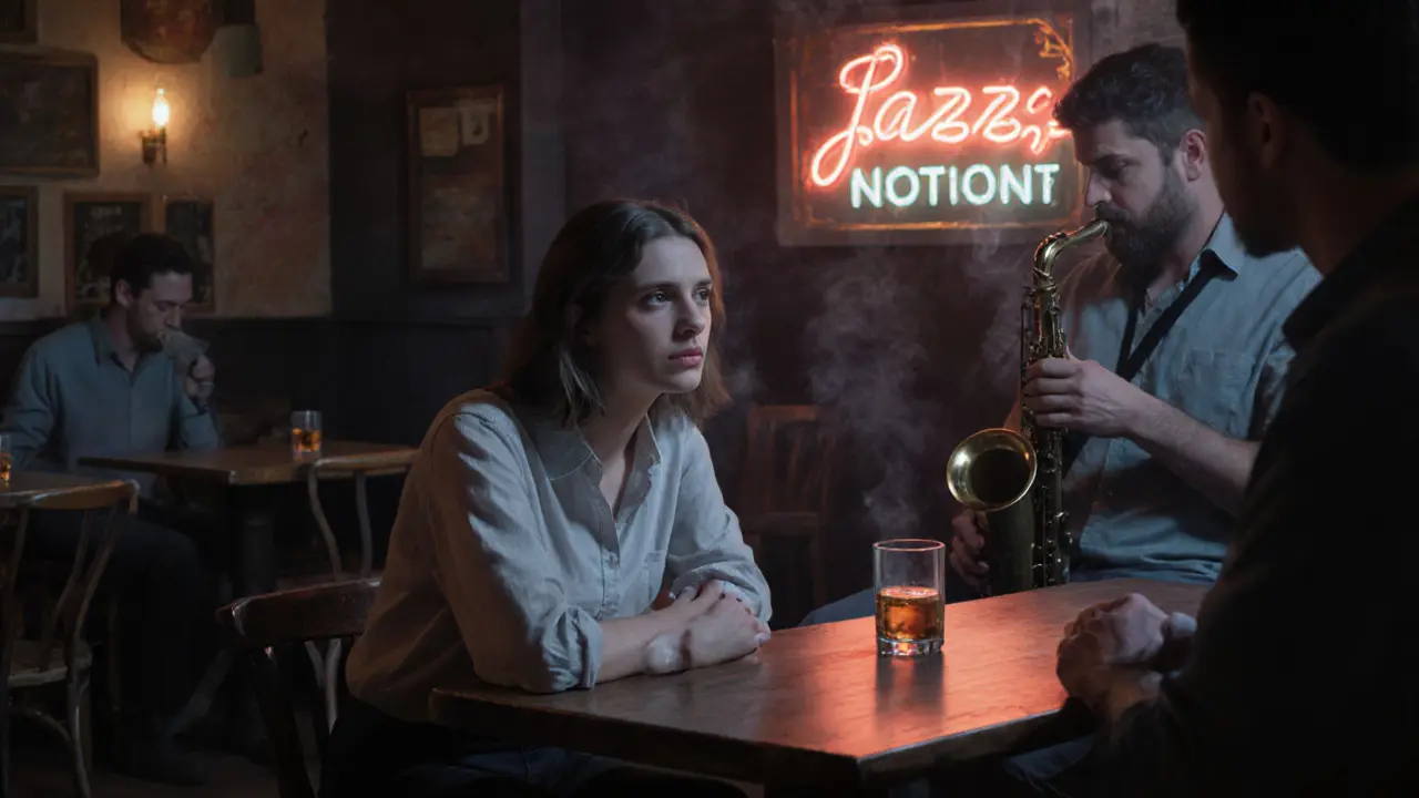 A model and a man converse quietly in a cozy jazz bar, no phones, only candlelight and music in the background.